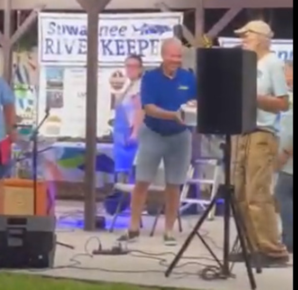 [Mayor Scott James Matheson draws the winning kayak raffle ticket]