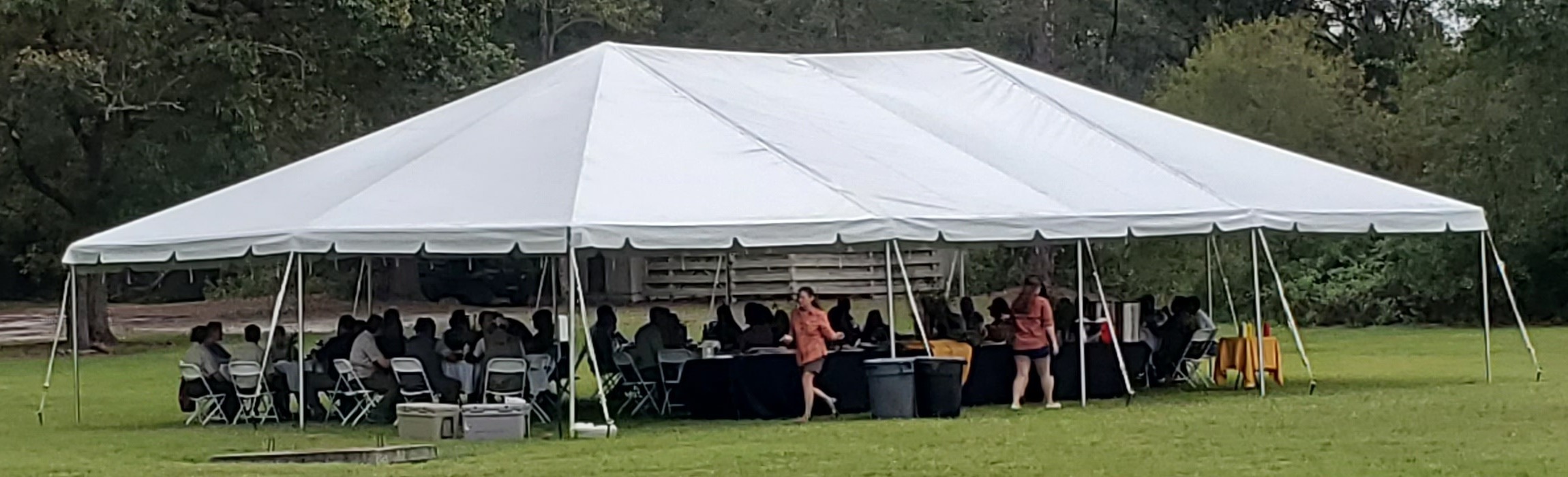 Dignitaries lunching in a tent, 12:23:21, 30.7385786, -82.1401877