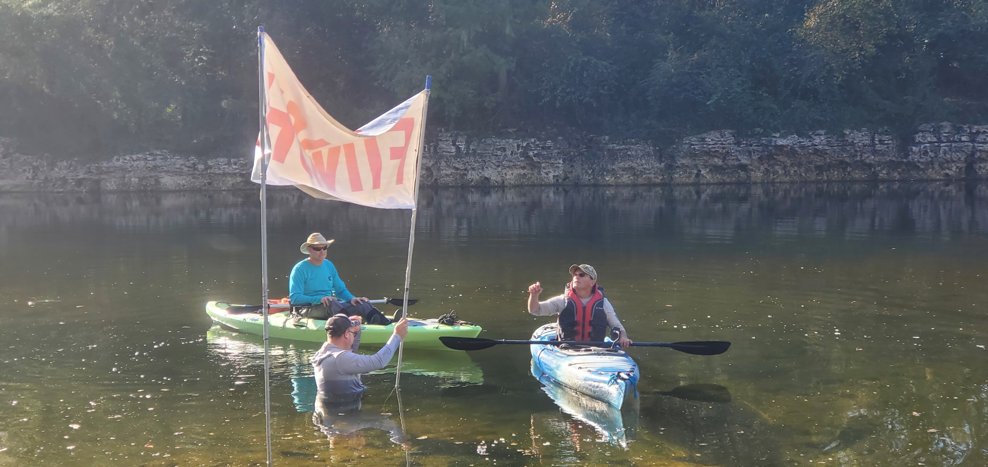 Dan Phillips and Russell Allen McBride helping with the Finish banner, 09:53:21, 30.6356646, -83.3112311