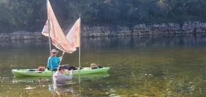 [Dan with a rock, Bobby with string at the Finish banner, 09:55:43, 30.6354726, -83.3111137]