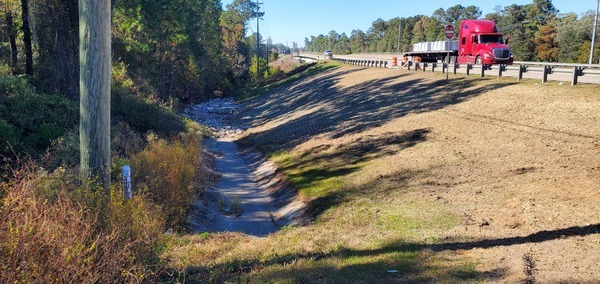 [Rocks in drainage ditch, GA 133 @ Withlacoochee River, 15:29:41, 30.8492208, -83.3386201]