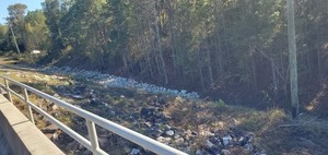 [Closeup, rocks, drainage ditch, 15:38:45, 30.8499359, -83.3397056]