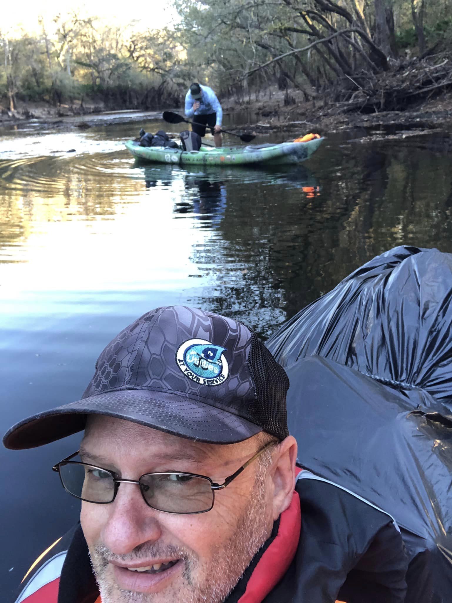 Boats with trash --Russell Allen McBride