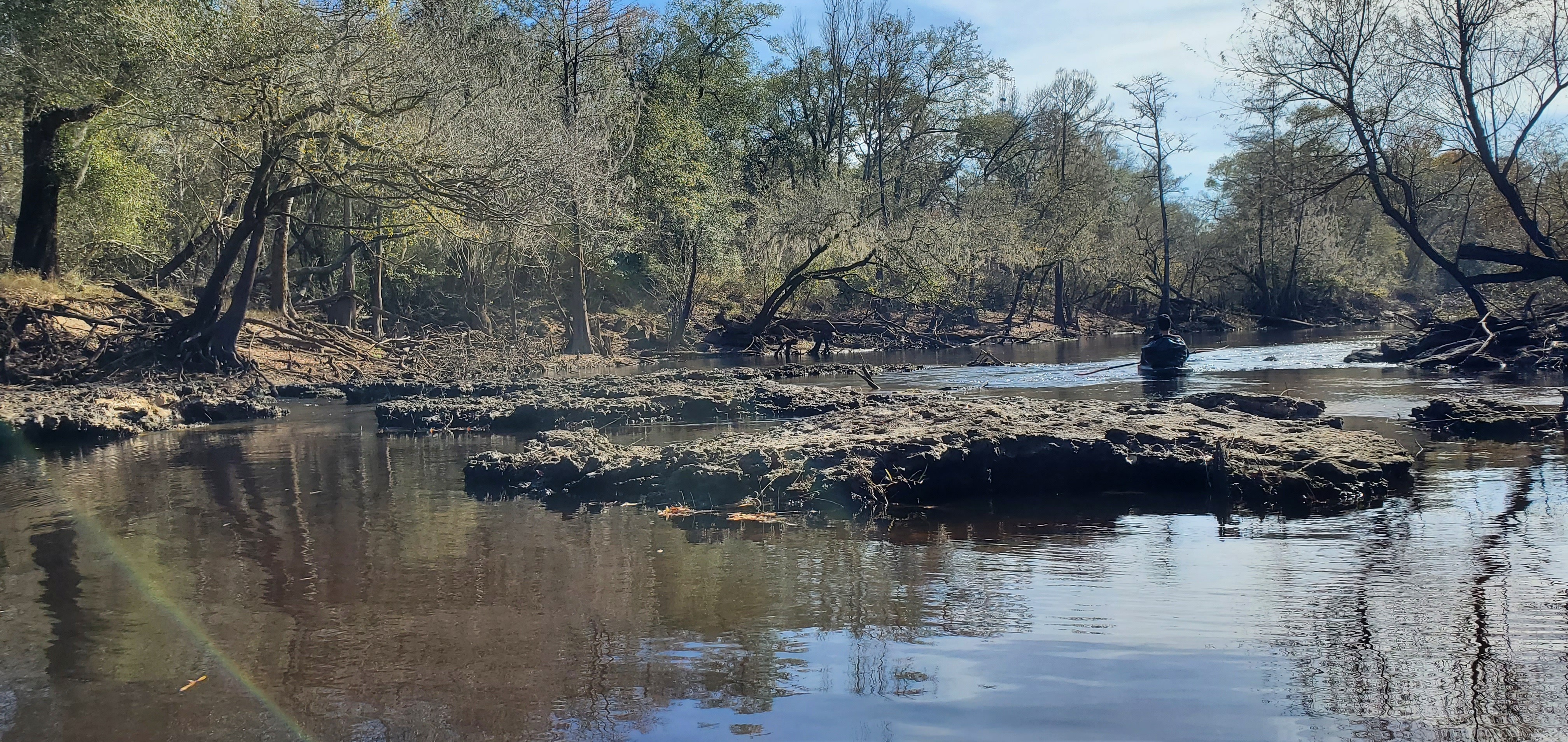 Boat beyond rocks, 12:43:22, 30.6948206, -83.4425850