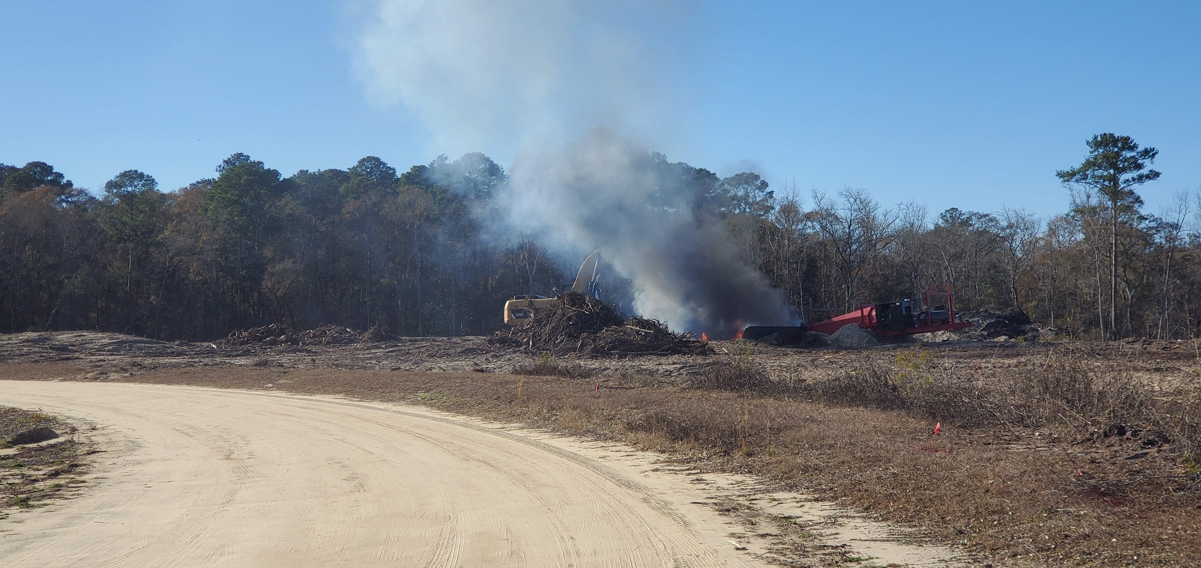 Burning, subdivision outside Langdale Park, Withlacoochee River, 2023:01:06 15:11:42, 30.8874810, -83.3165840