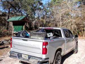 [Bobby's truck with trash at Sasser Landing --Suzy Hall]