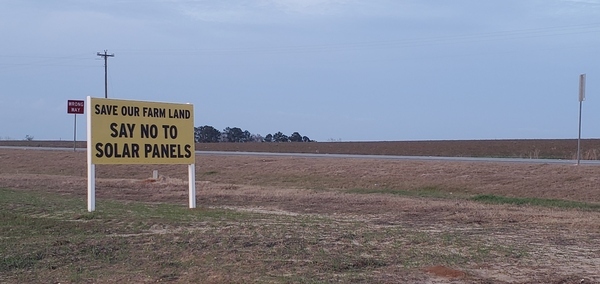 [Save our farm land, say not to solar panels, sign on Van F. Murphy property, west of GA 133, 17:51:29, 30.9358730, -83.4856480]