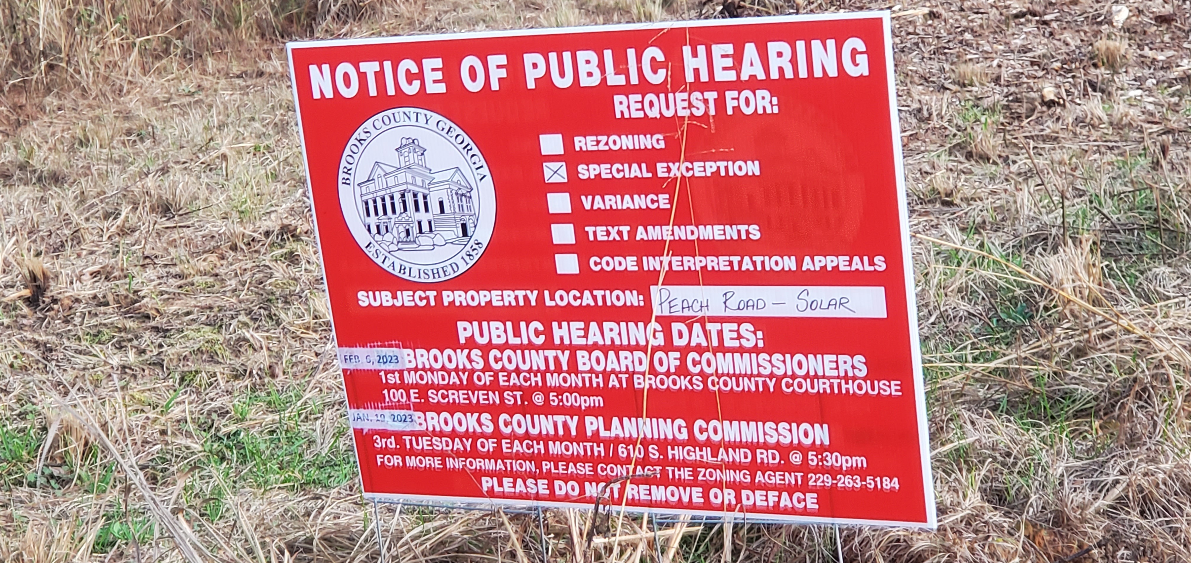 Closeup, rezoning notice sign, 17:43:39, 30.9510626, -83.4834273