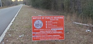 [Public Hearing notice sign, 17:21:27, 30.9600595, -83.4554060]