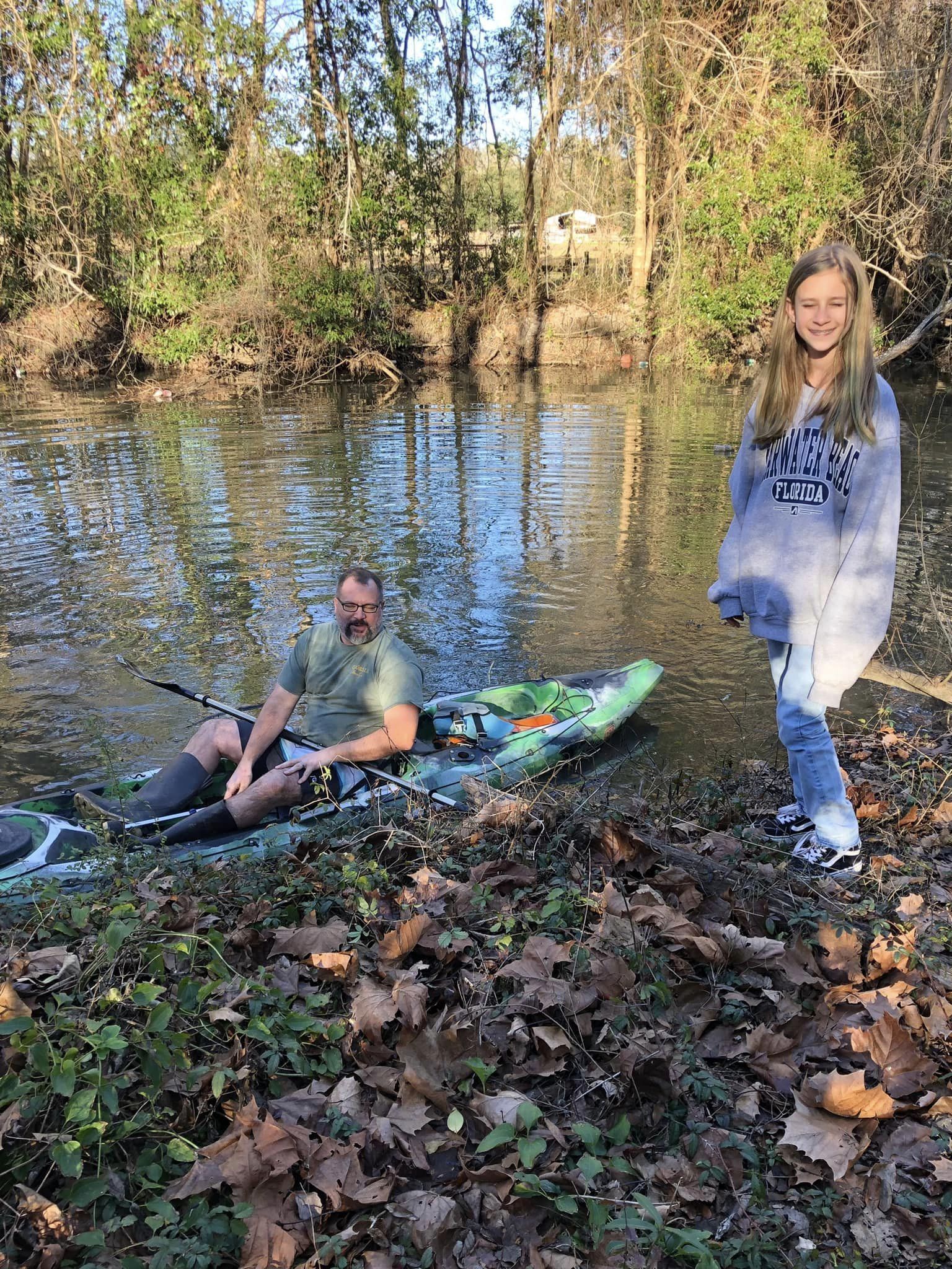 Bobby McKenzie with kayak and Saige --Russell Allen McBride