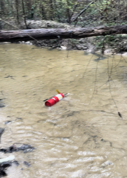 [Fire extinguisher in creek; Photo: Bobby McKenzie]