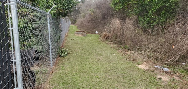 [Sewer main looking north towards E. Park Ave., 15:43:23, 30.8436471, -83.2449044]