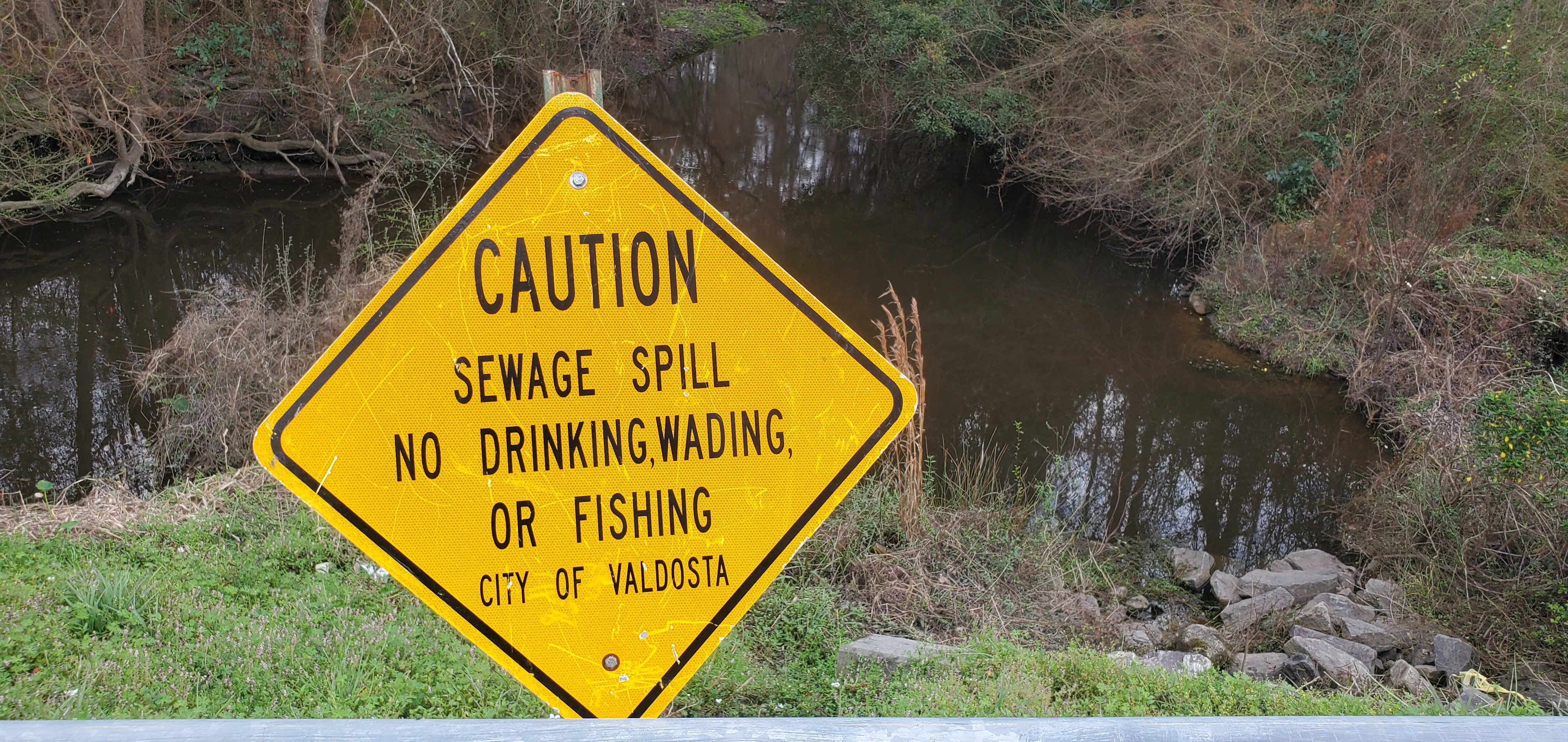 Knights Creek downstream with spill sign, 15:22:54, 30.8611843, -83.2547908