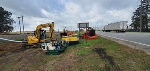 [Bypass pump and Valdosta, A City Without Limits sign on US 84, 2023:02:28 09:15:27, 30.8433993, -83.2446536]