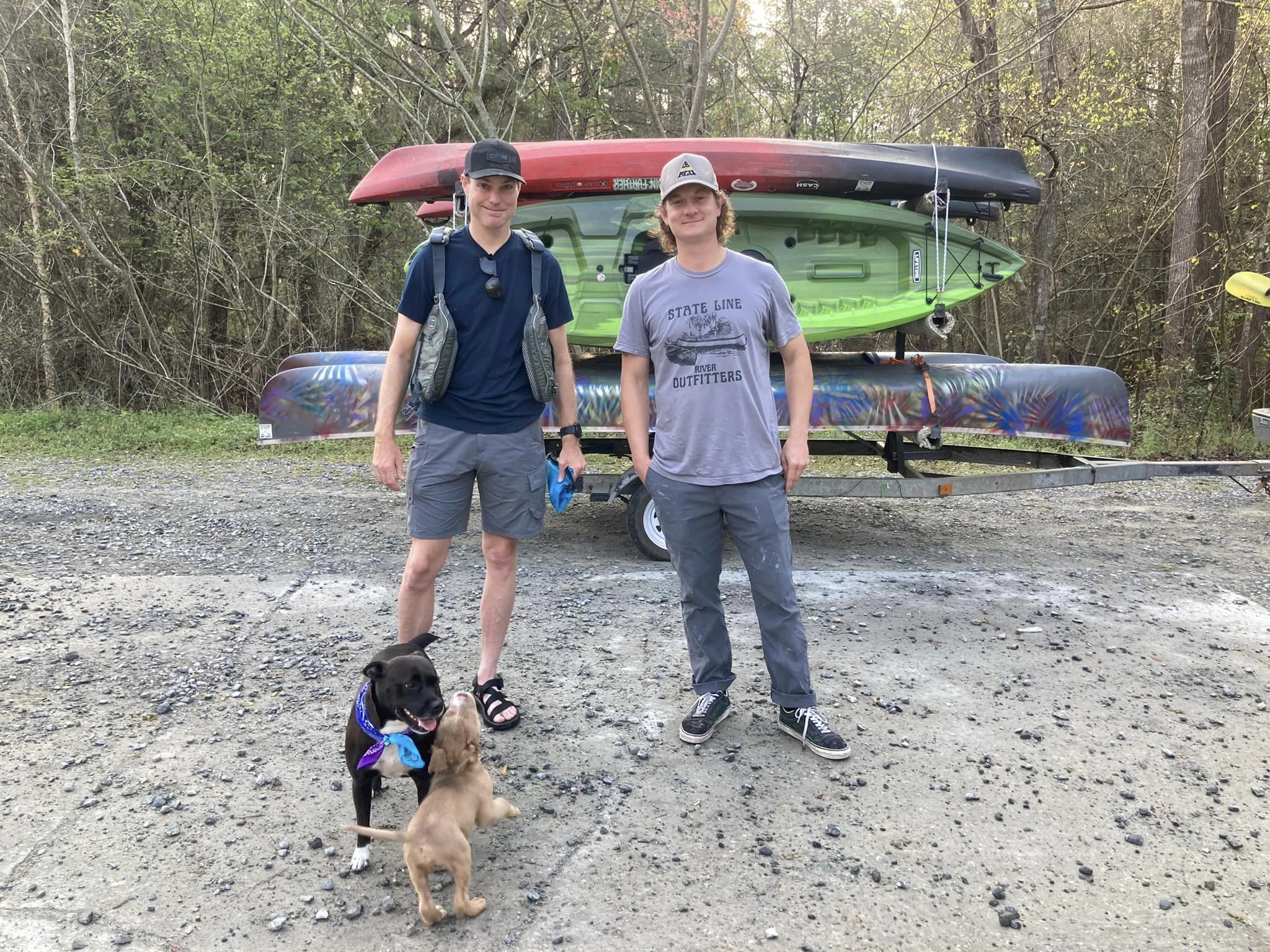 Bird Chamberlain with State Line Outfitters boats, his dog, and the lost puppy