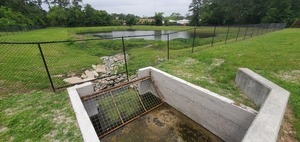 [Trash trap, Lee Street detention pond, above One Mile Branch]