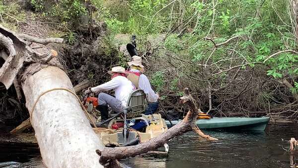 [Movie: TJ saws Duck and Float Under, jsq & Phil R. steady the boat --Shirley Kokidko 12:11:28 (48M)]