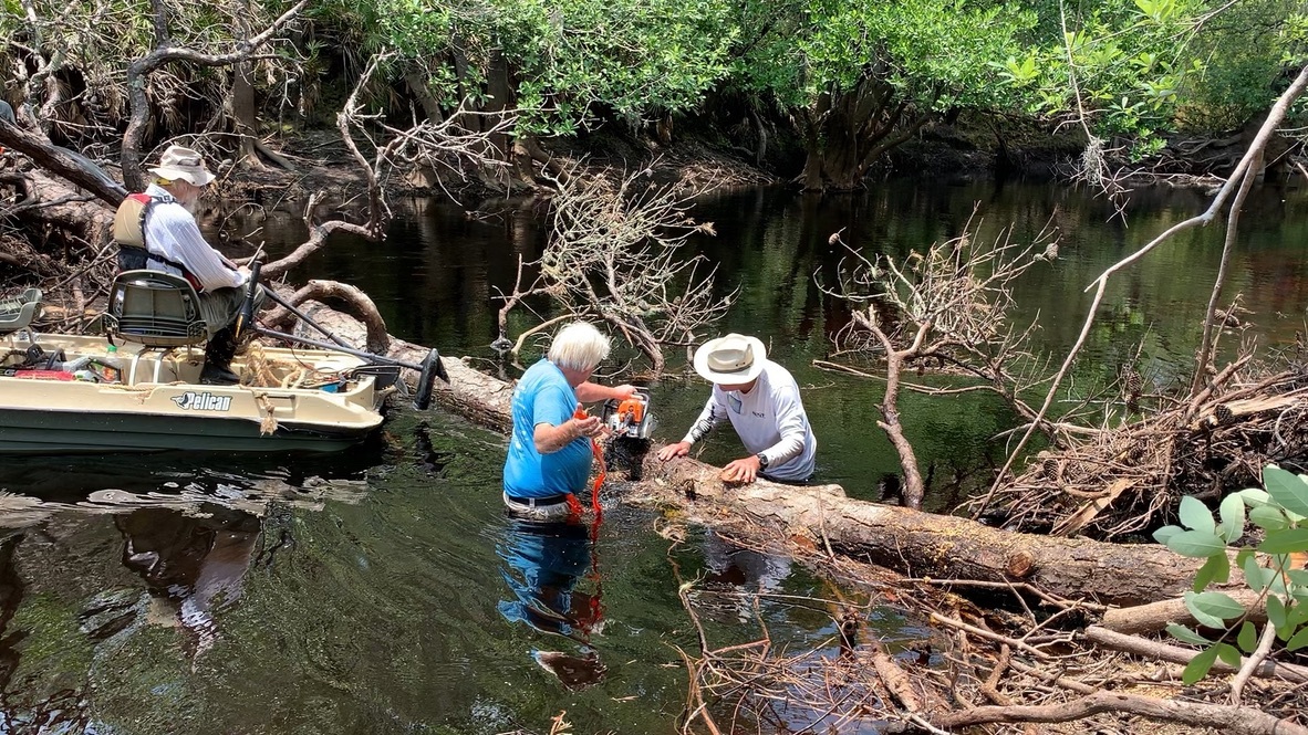 jsq, Phil Hubbard sawing Portage Logjam, TJ --Shirley Kokidko