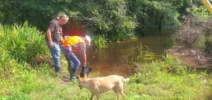 [David Vedas getting water temperature]