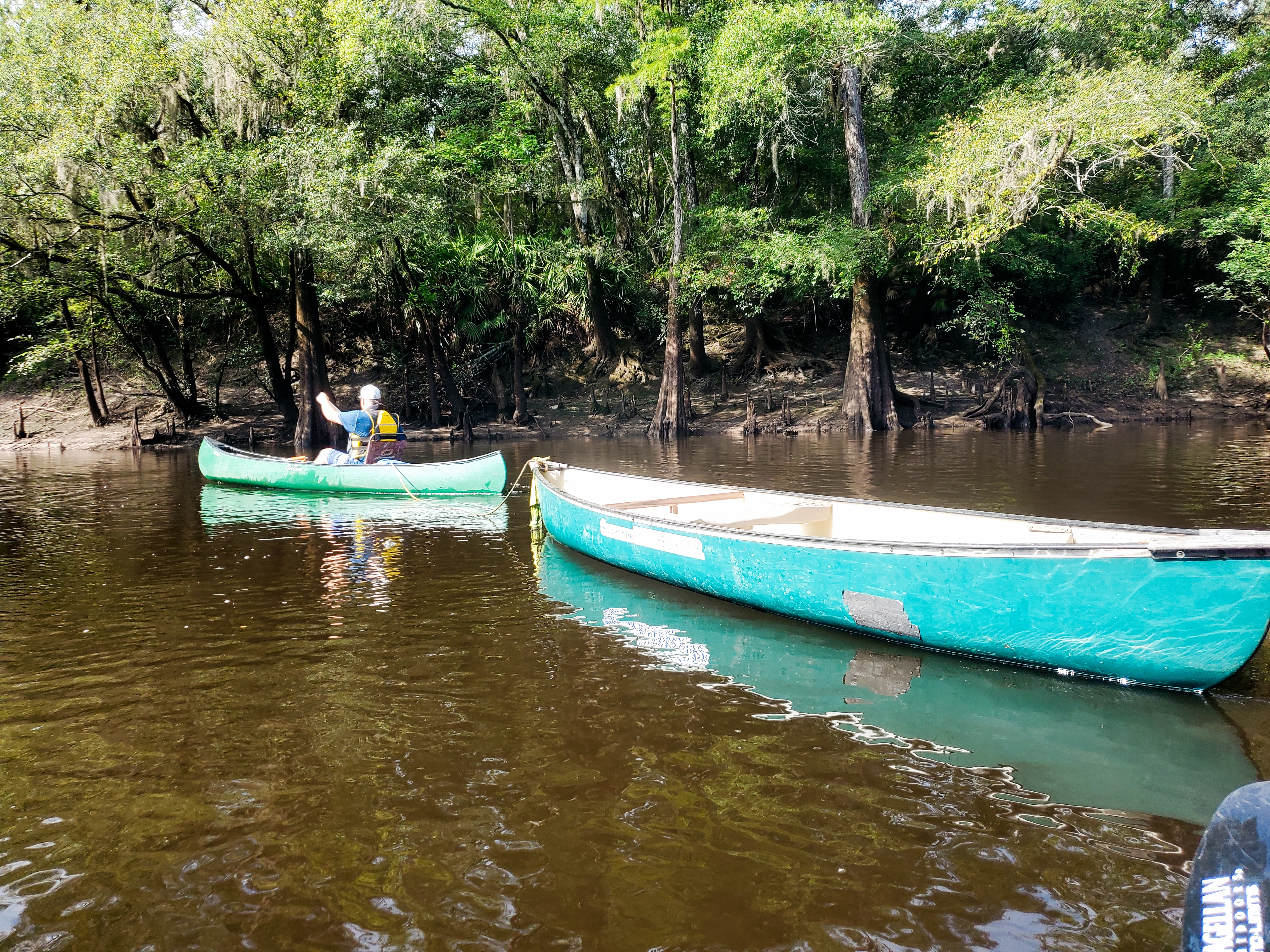 William Szalkay with WWALS canoes as trash barges, 10:12:22, 30.7119313, -83.4555102