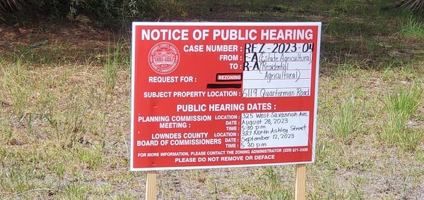 [Sign: REZ-2023-04 6119 Quarterman Road, E-A to R-A]