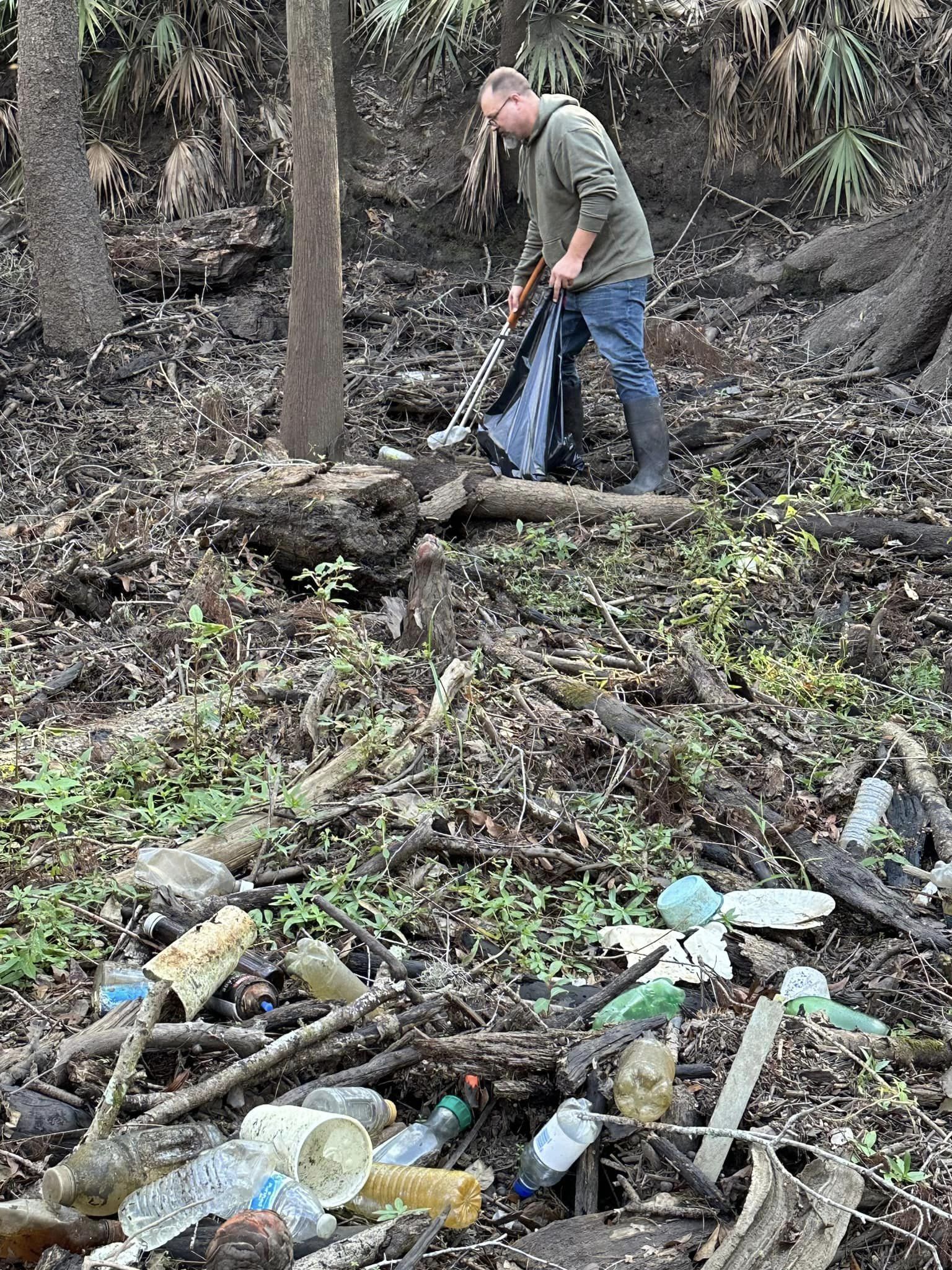 Bobby McKenzie with trash picker from Current Problems --Russell Allen McBride