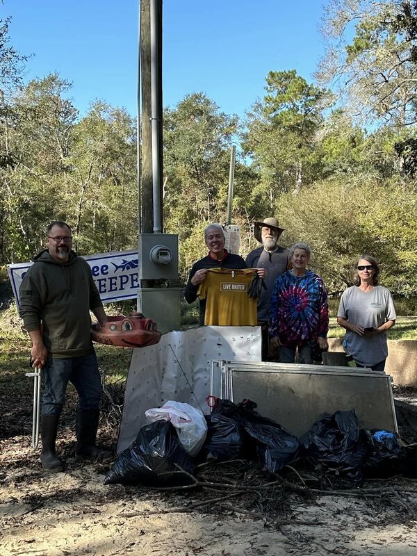 Trash bagged, with 4 shower doors, a big screen tv, a kids toy float tug boat and lots of plastic and styrofoam, glass and aluminum. --Russell Allen McBride