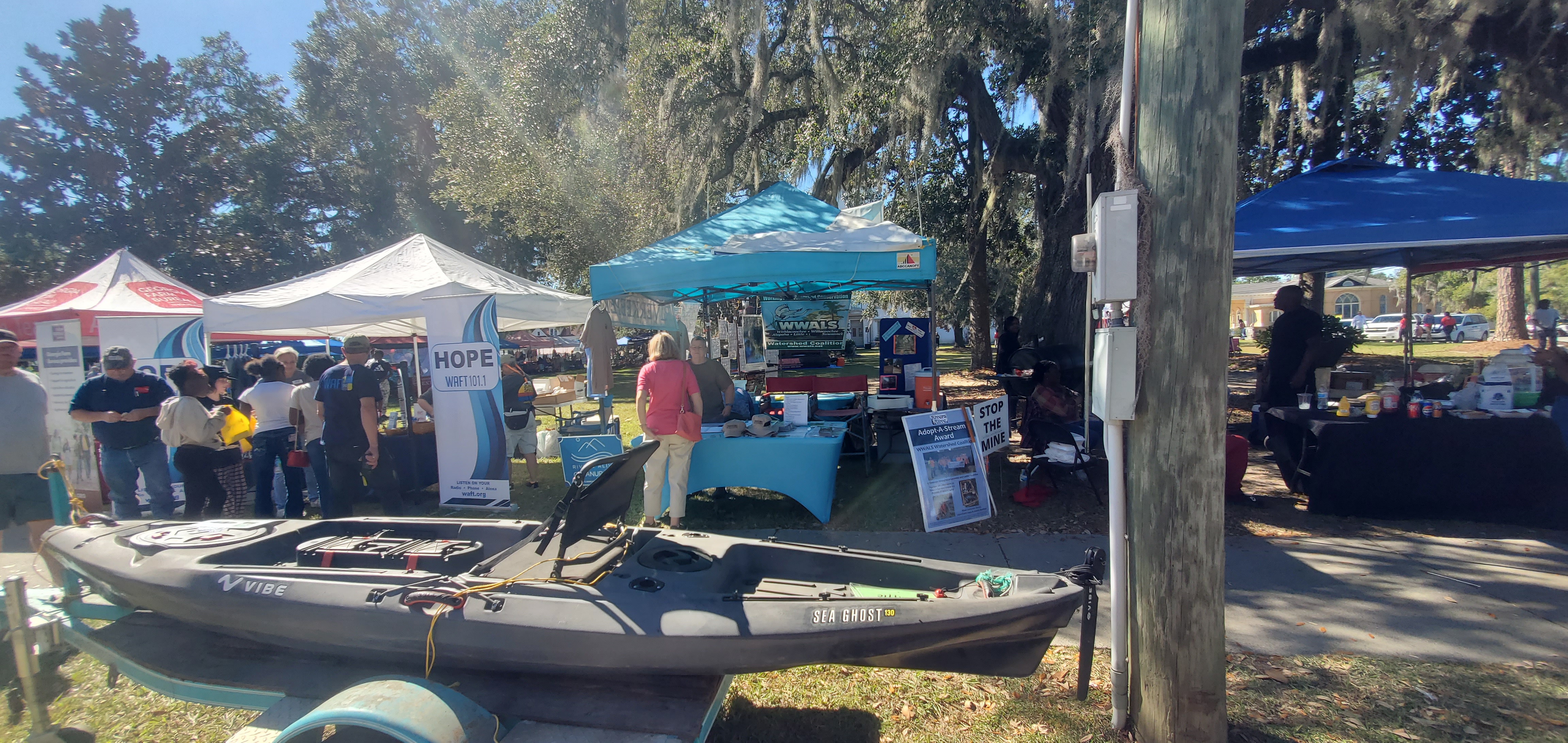 Raffle kayak and Jan Powell at the WWALS Booth