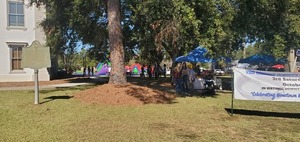 [Courthouse plaque and Skillet Fest banner]