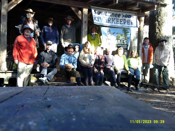 Everybody with banners, Hebard Cabin, Floyds Island, Okefenokee Swamp --Gretchen Quarterman, 30.8560404, -82.2670003