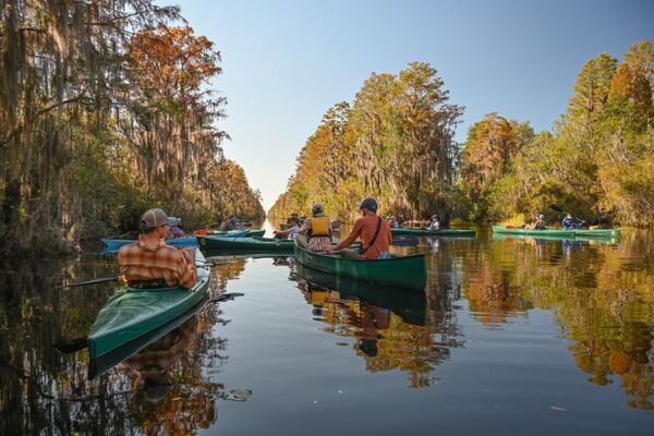 [Mike Worley, CEO, Georgia Wildlife Federation welcomes Georgia Water Coalition members at the Okefenokee Swamp Park.]