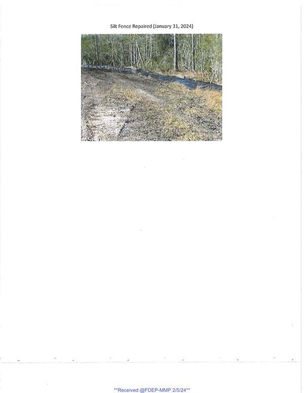Photo: Silt Fence Repaired