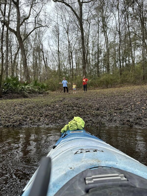 [Tetiana Babcock and her Mom and daughter Teagen wishing us well as we paddle by their property. --Russell Allen McBride]