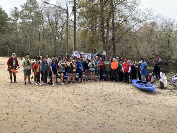 [Paddlers and banners at Langdale Park --Gretchen Quarterman]