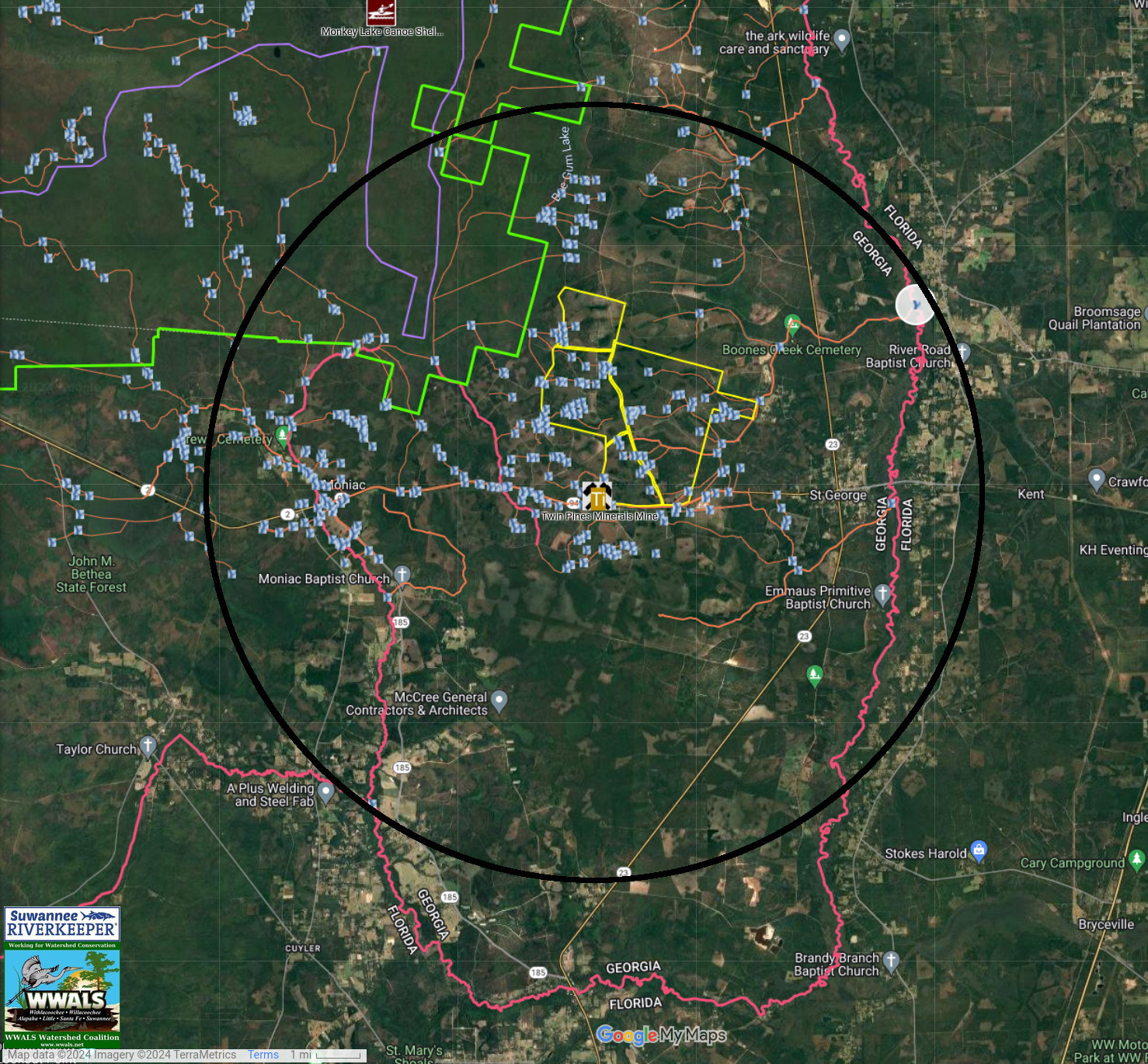 A circle of radius approximately 44,608 feet around the TPM mine site reaches the Middle Prong of the St. Marys River to the southwest, Cross Creek to the Northwest, and Boone Creek to the northeast, with parts of two Florida counties and two Georgia counties inside it, as well as Moniac, the Cherokee of Georgia Tribal Grounds, and St. George.