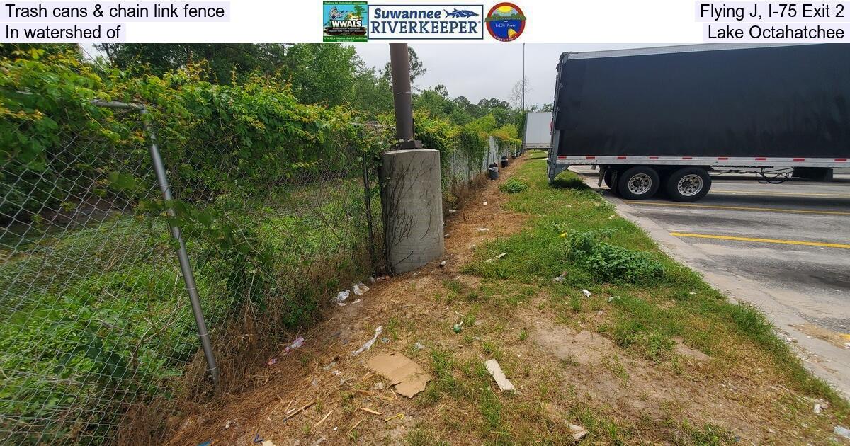 Trash cans & chain link fence, Flying J, I-75 Exit 2, In watershed of Lake Octahatchee