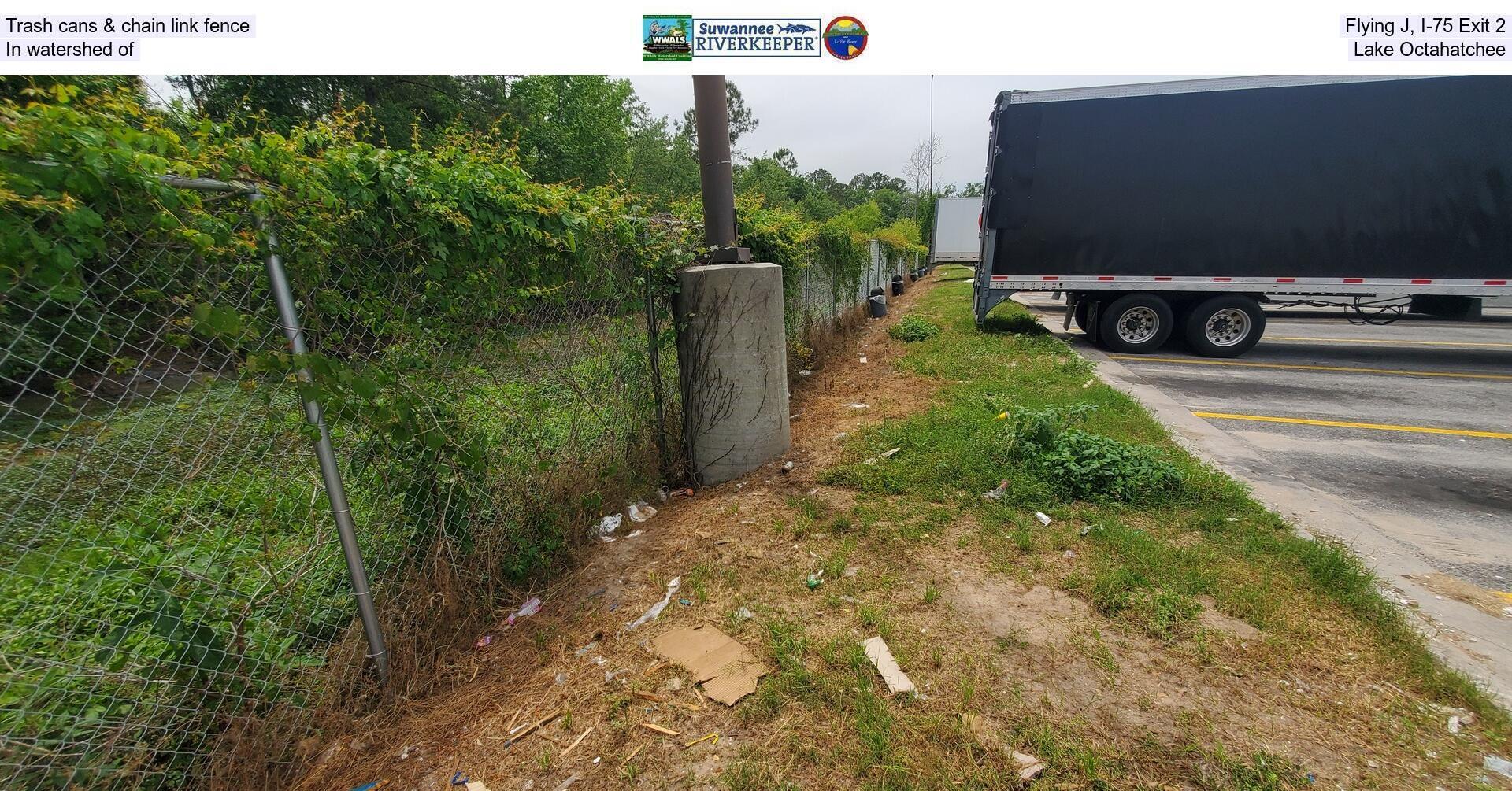 Trash cans & chain link fence, Flying J, I-75 Exit 2, In watershed of Lake Octahatchee