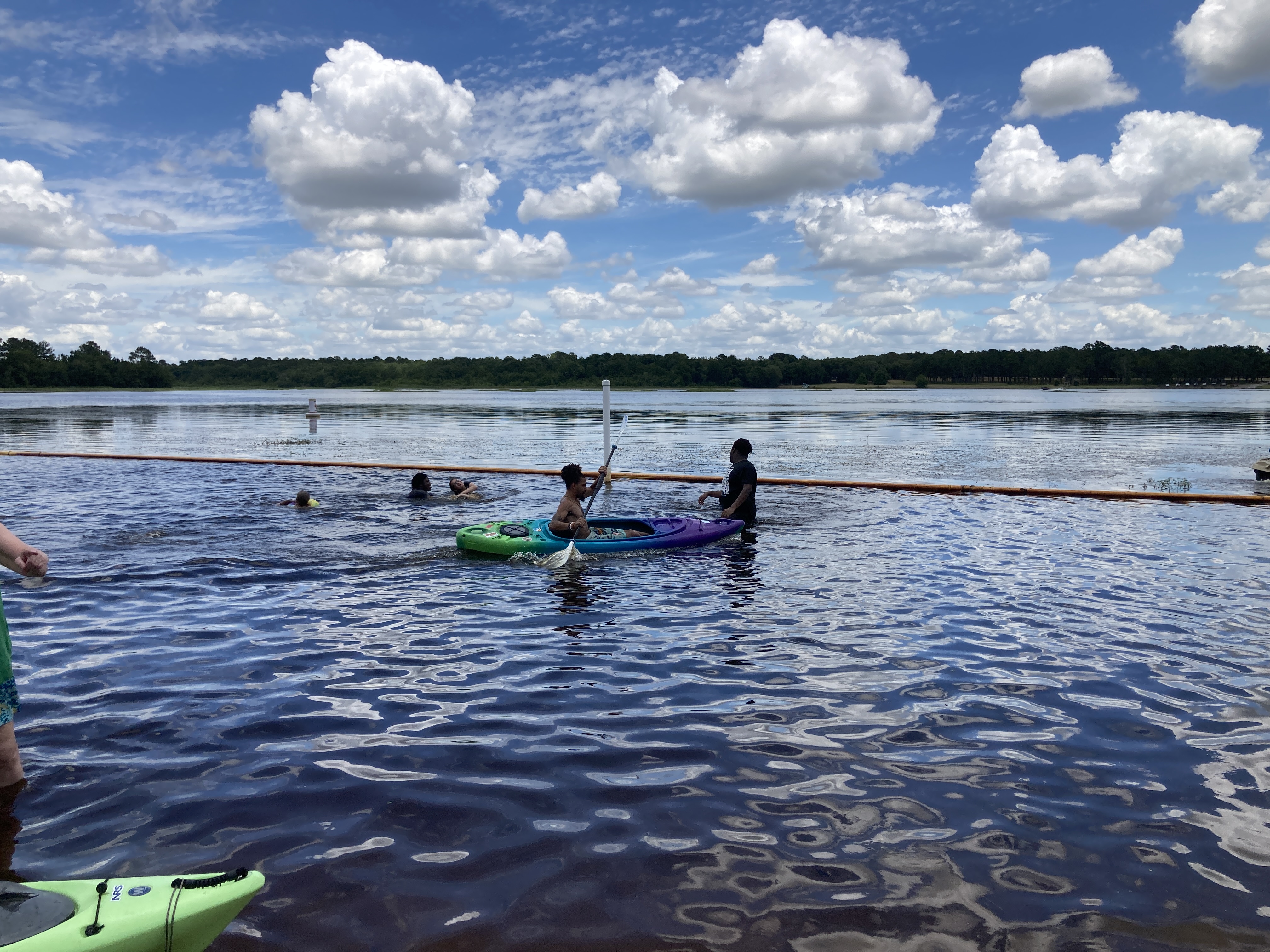 Swimmers and kayak, 13:42:05 --Gretchen Quarterman