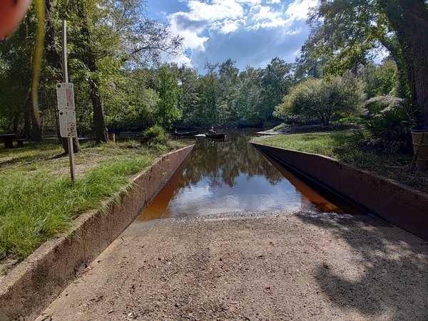 [Suwannee Riverkeeper jon boat hauling TJ canoe --Phil Royce, 17:00:42, 30.88758, -83.3237]