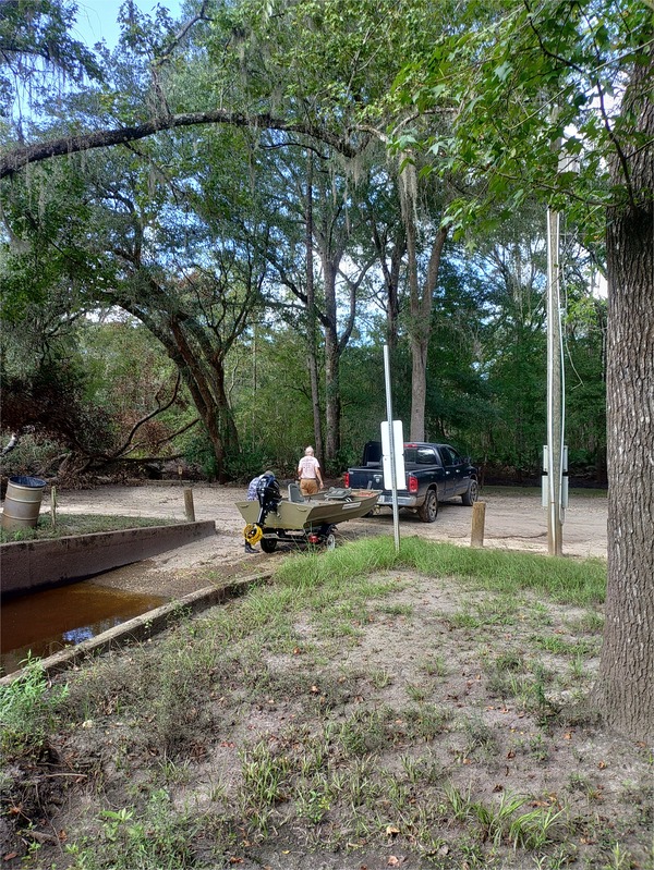 [Unloading Suwannee Riverkeeper jon boat --Phil Royce, 17:25:42, 30.8874, -83.32375]