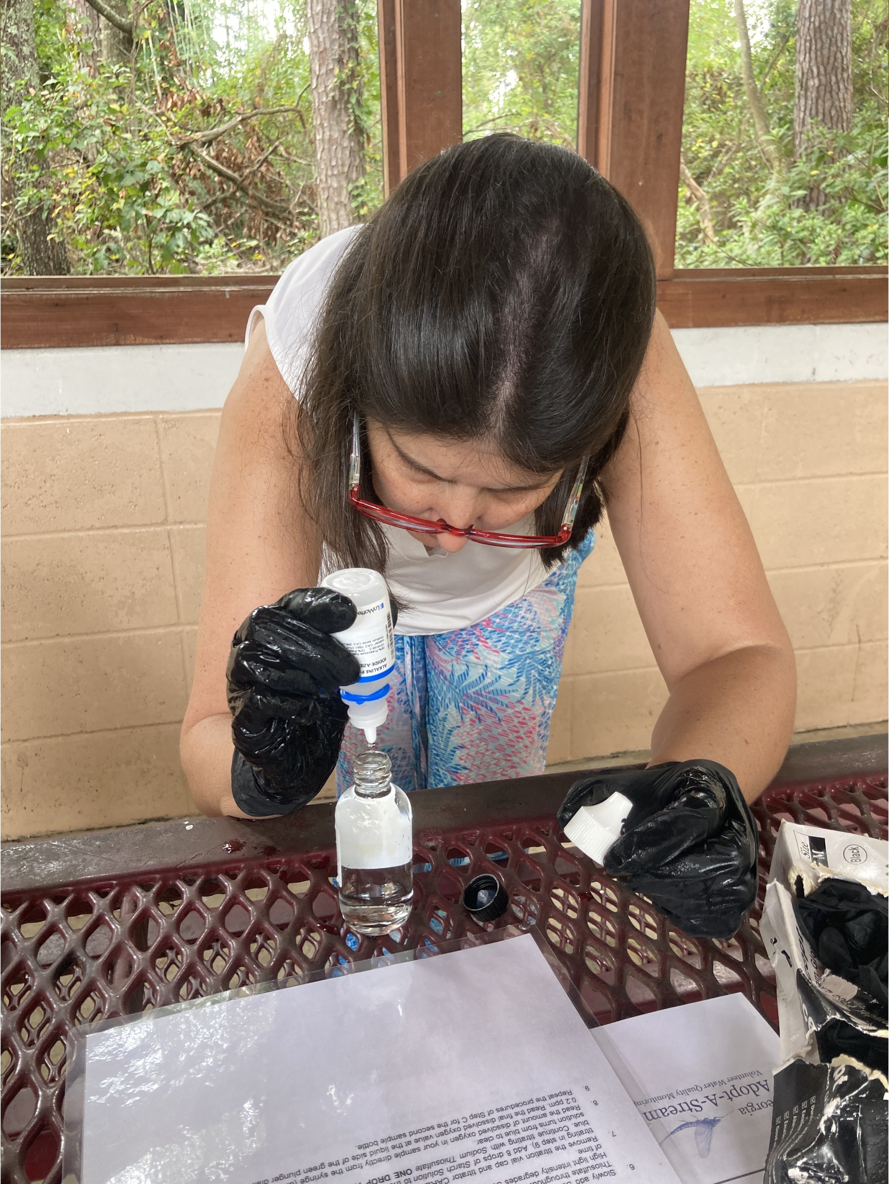 Janet Massengale of Valdosta, Georgia, carefully dripping alkaline --Gretchen Quarterman