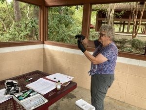 [Heather examining pH --Gretchen Quarterman]