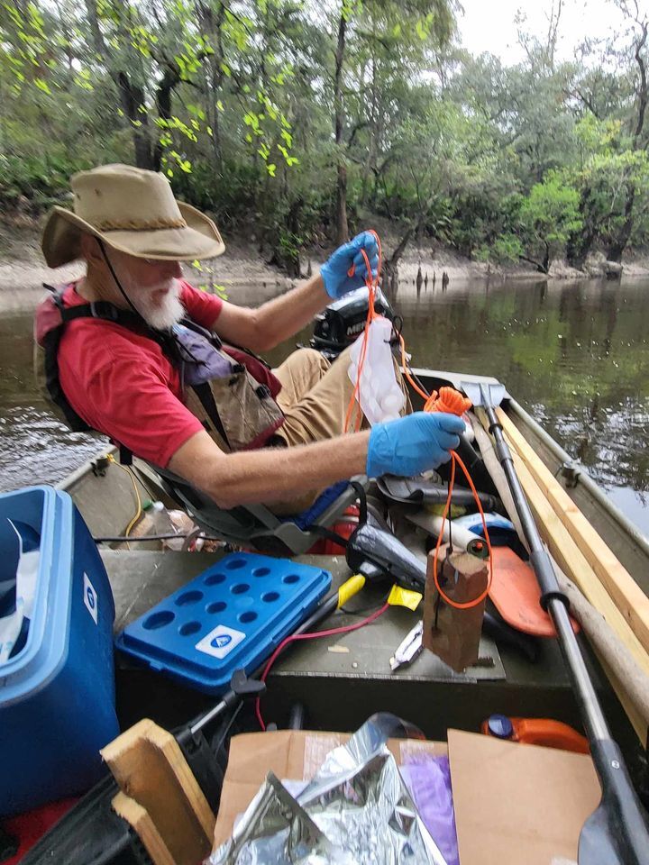 Preparing the downstream PFAS sampler --Troy Toreson, 30.8284134, -83.3855957