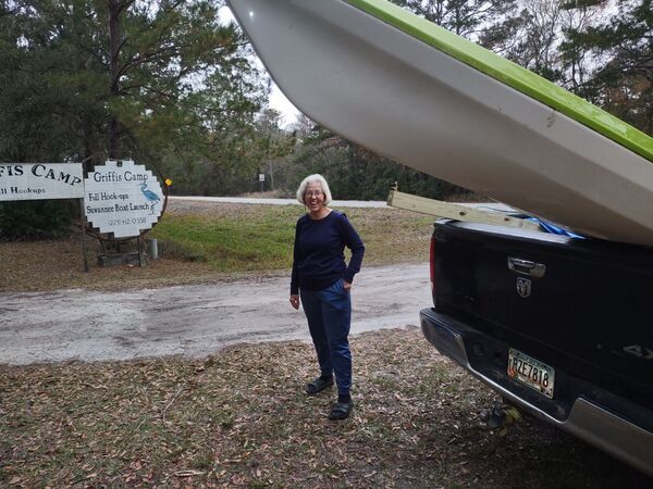 Shirley Kokidko with the Griffis Camp signs --Richard Fowler