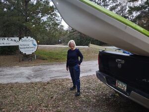 [Shirley Kokidko with the Griffis Camp signs --Richard Fowler]