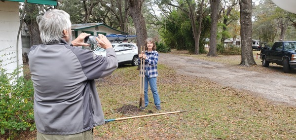 [Richard Fowler photographing Linda Tindall at Griffis Fish Camp]