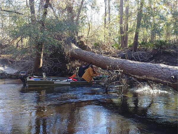 [Gee Edwards and John S. Quarterman sawing in WWALS jon boat --Phil Royce, 10:16:33]