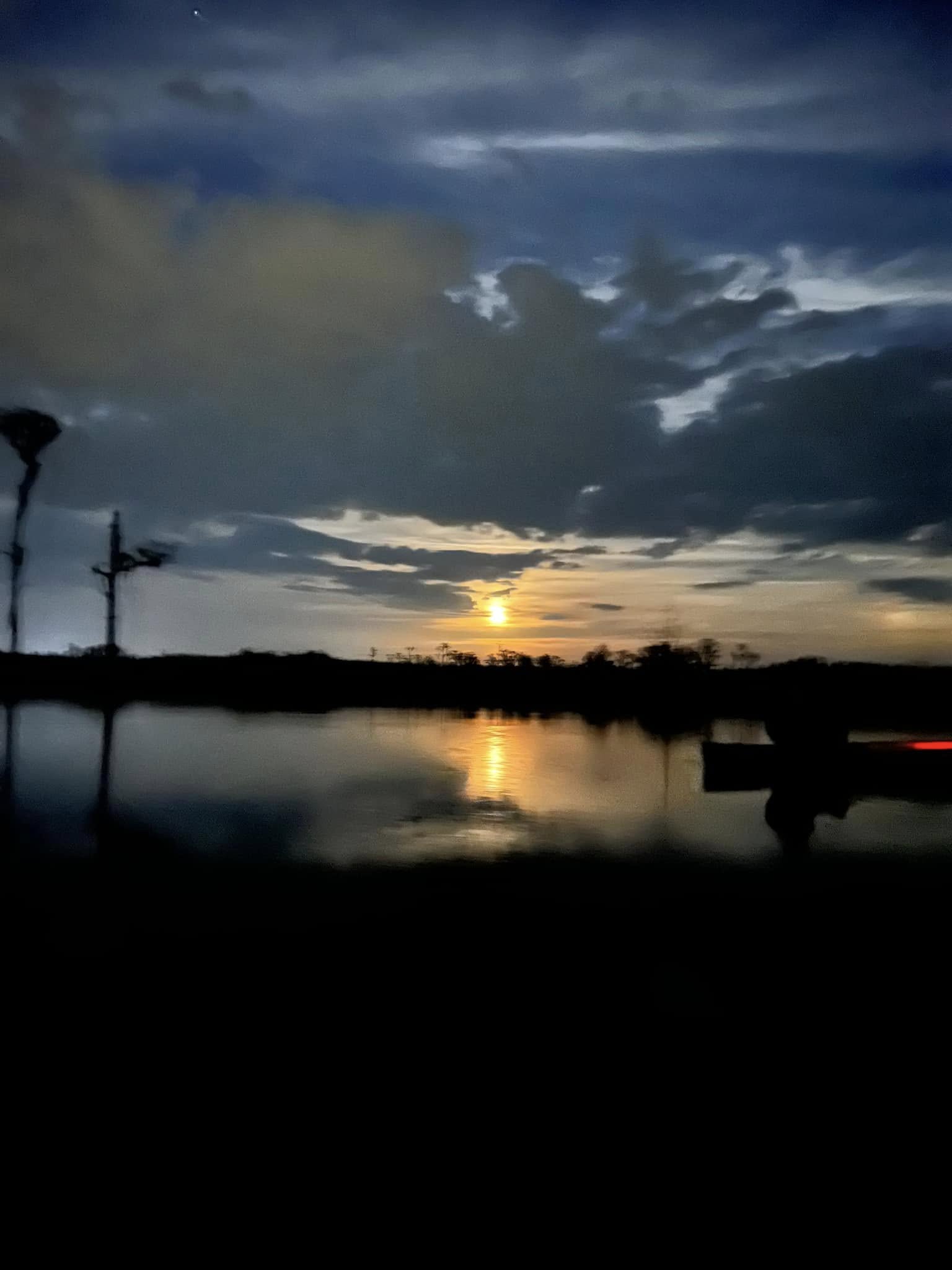 Moonrise with boat --Kimberly Godden Tanner