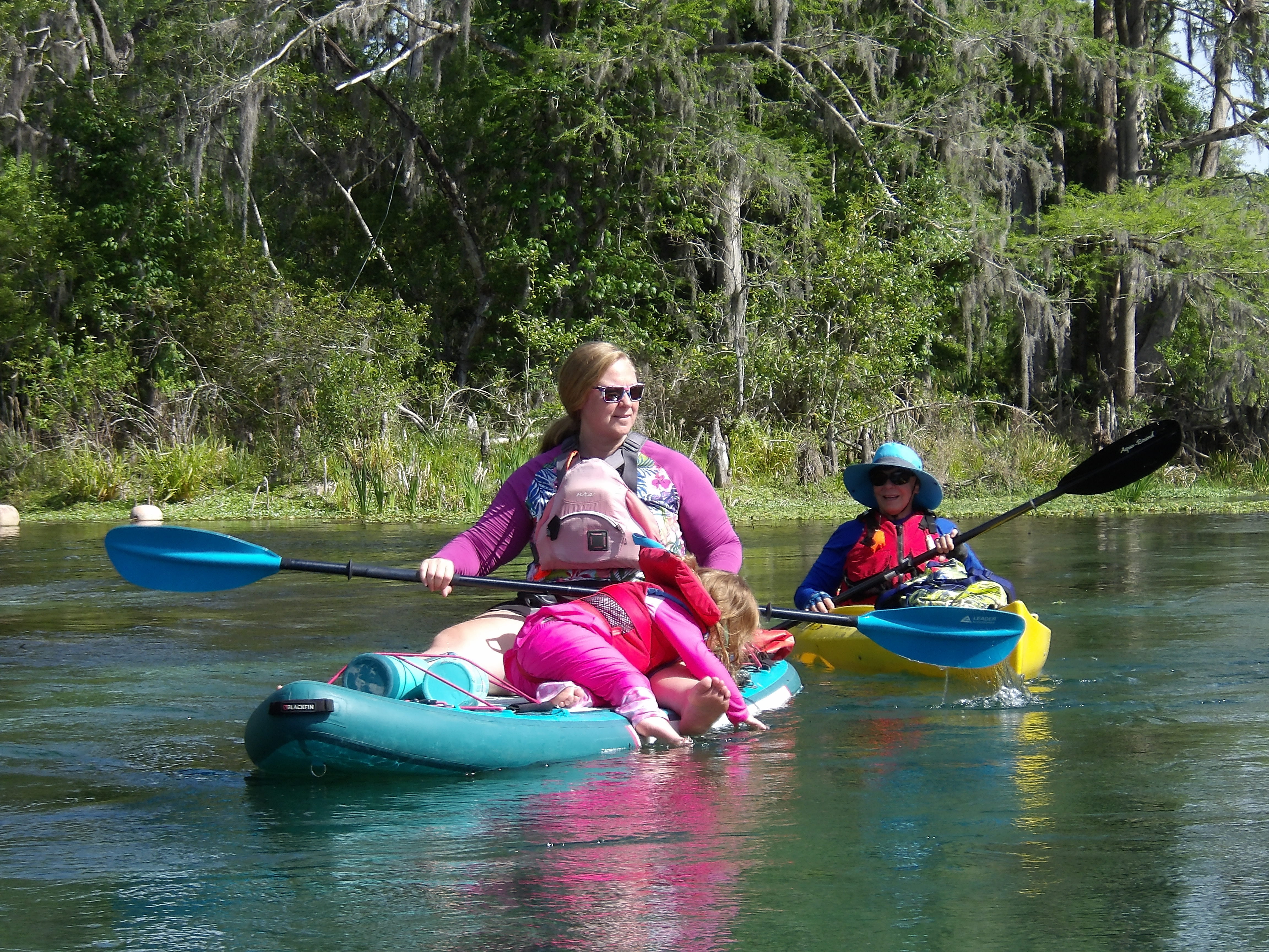 Mother and child and paddler --Janet Martin