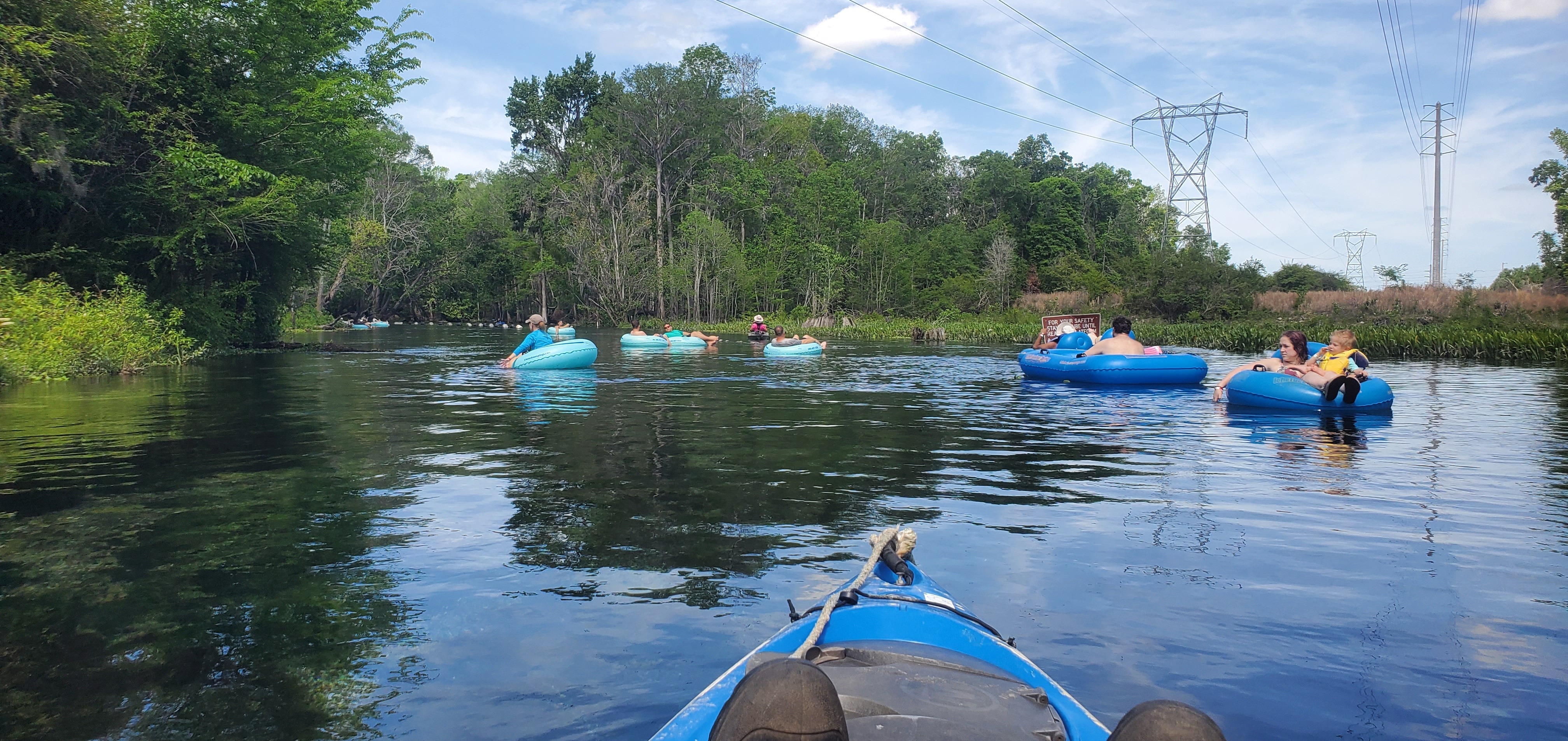 Tubers at For Your Safety sign, 11:51:08, 29.9545451, -82.7831447